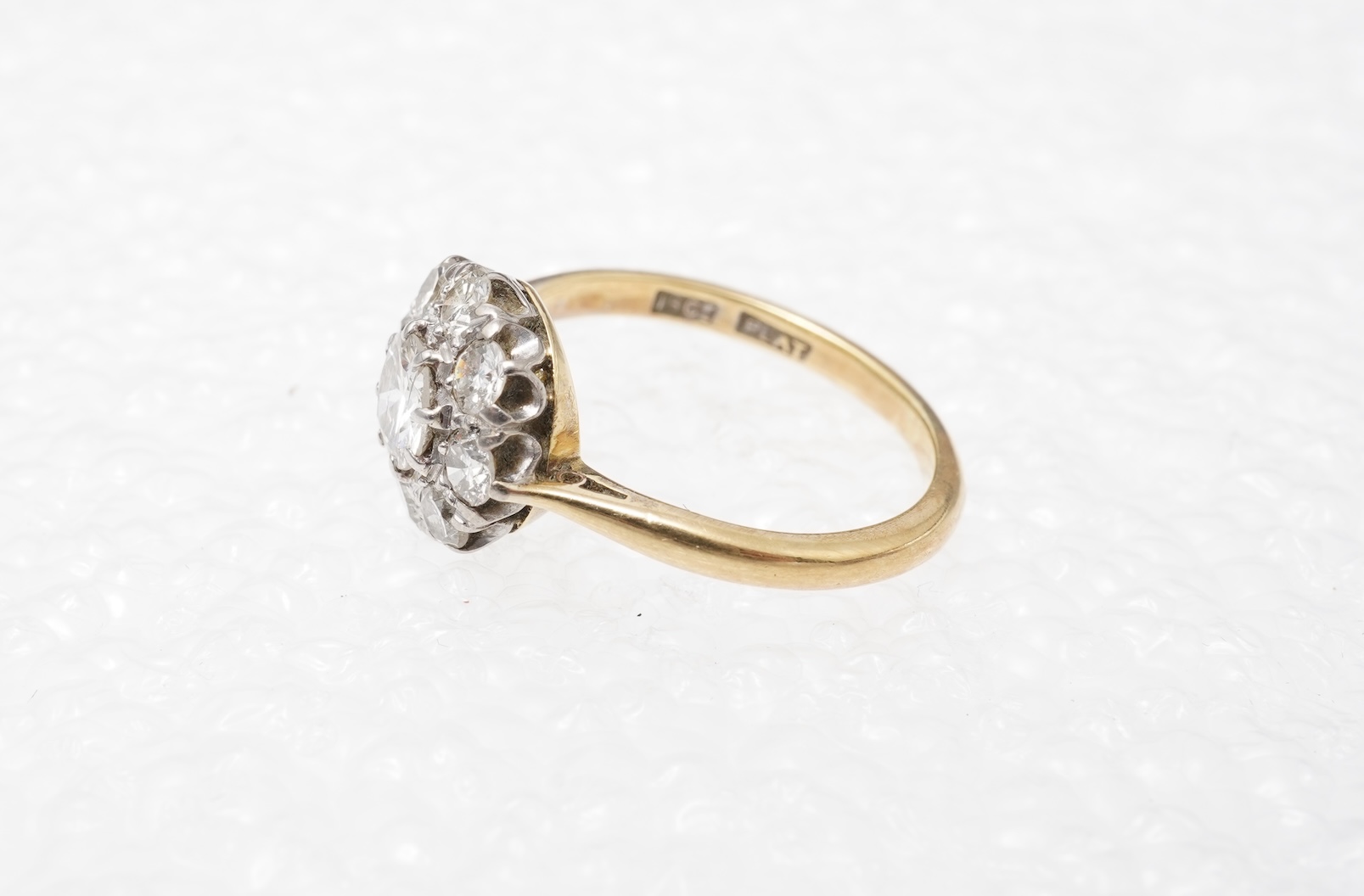 A diamond cluster ring